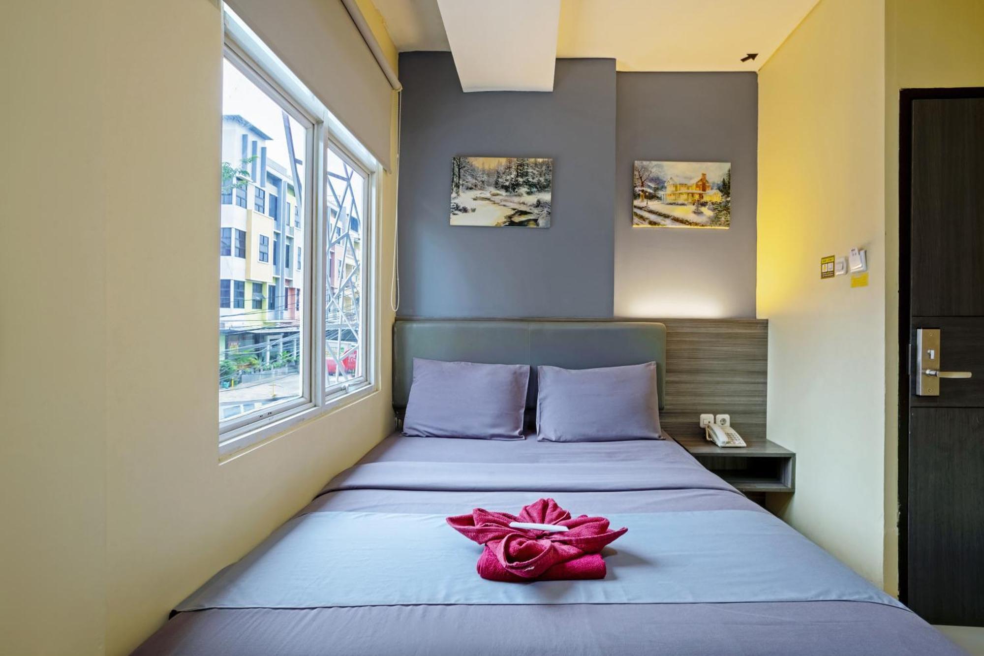 City Biz Residence Jakarta Room photo